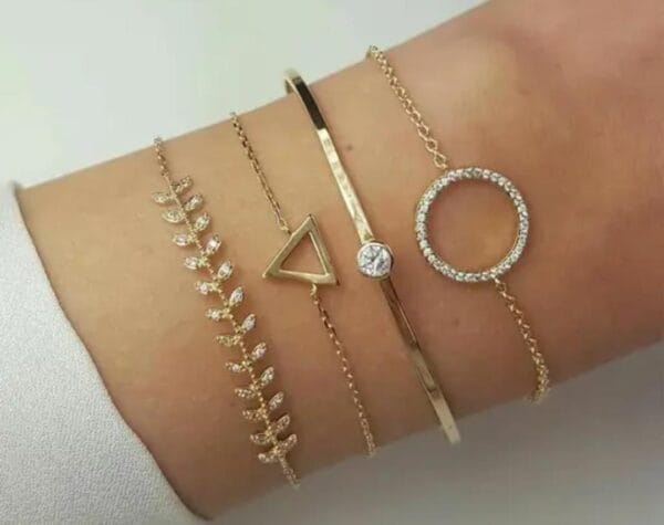 Radiant Harmony: Pack of 4 Gold-Plated Adjustable Bracelets with American Diamonds