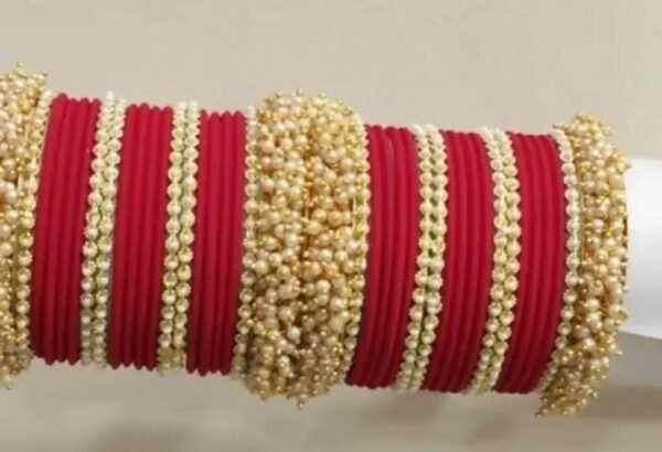 Main image showcasing the Red Gold-Plated Bangles Set, featuring intricate designs and a luxurious gold finish, perfect for ethnic wear and parties.