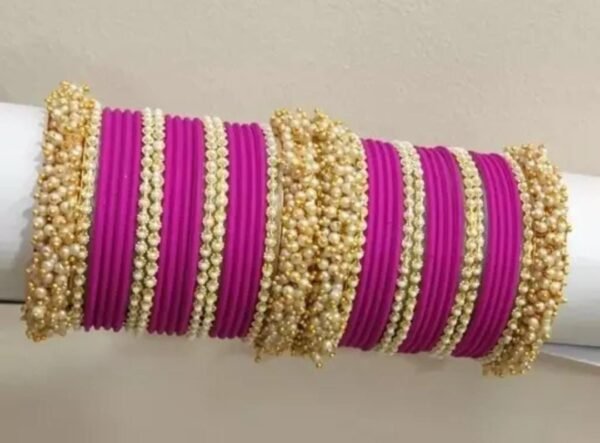 Main image showcasing the Pink Gold-Plated Bangles Set, featuring intricate designs and a luxurious gold finish, perfect for ethnic wear and parties.