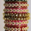 Multicolored Rajasthani Chuda split into two sets for each hand, showcasing intricate kundan stone work and vibrant hues.