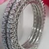 Close-up of the Silver-Plated Bangles Set with cubic zirconia, photographed from the left angle to highlight its intricate design and shimmering finish.