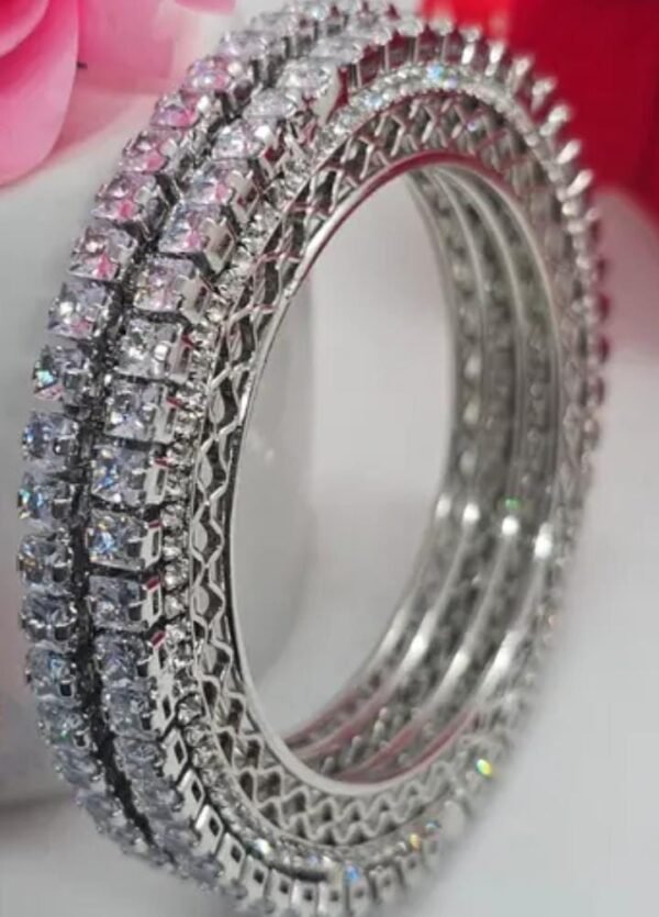 Close-up of the Silver-Plated Bangles Set with cubic zirconia, photographed from the left angle to highlight its intricate design and shimmering finish.