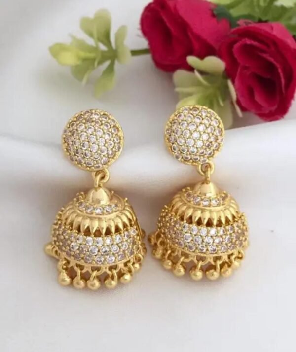 Elegant gold-plated American diamond jhumki earrings featuring sparkling stones and a beautiful ethnic design—perfect for modern and traditional styles