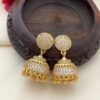 Side-angle view of gold-plated American diamond jhumki earrings, showcasing intricate detailing and sparkling stones—perfect for ethnic and modern wear.