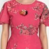 Close-up of the pink floral maxi dress top, showcasing round neck, flared sleeves, soft georgette fabric, and intricate floral patterns.