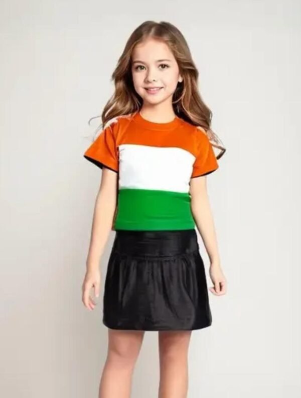 Girl wearing a t-shirt with horizontal orange, white, and green stripes inspired by the Indian flag
